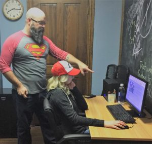 Manager Points Out Review Location