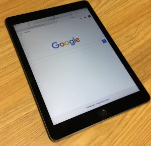 Google on A Tablet A Google Penalty Drops Your Ranking and Makes It Tough to Do Business Online.