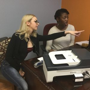 Employees Discussing SEO vs PPC Lead Generation
